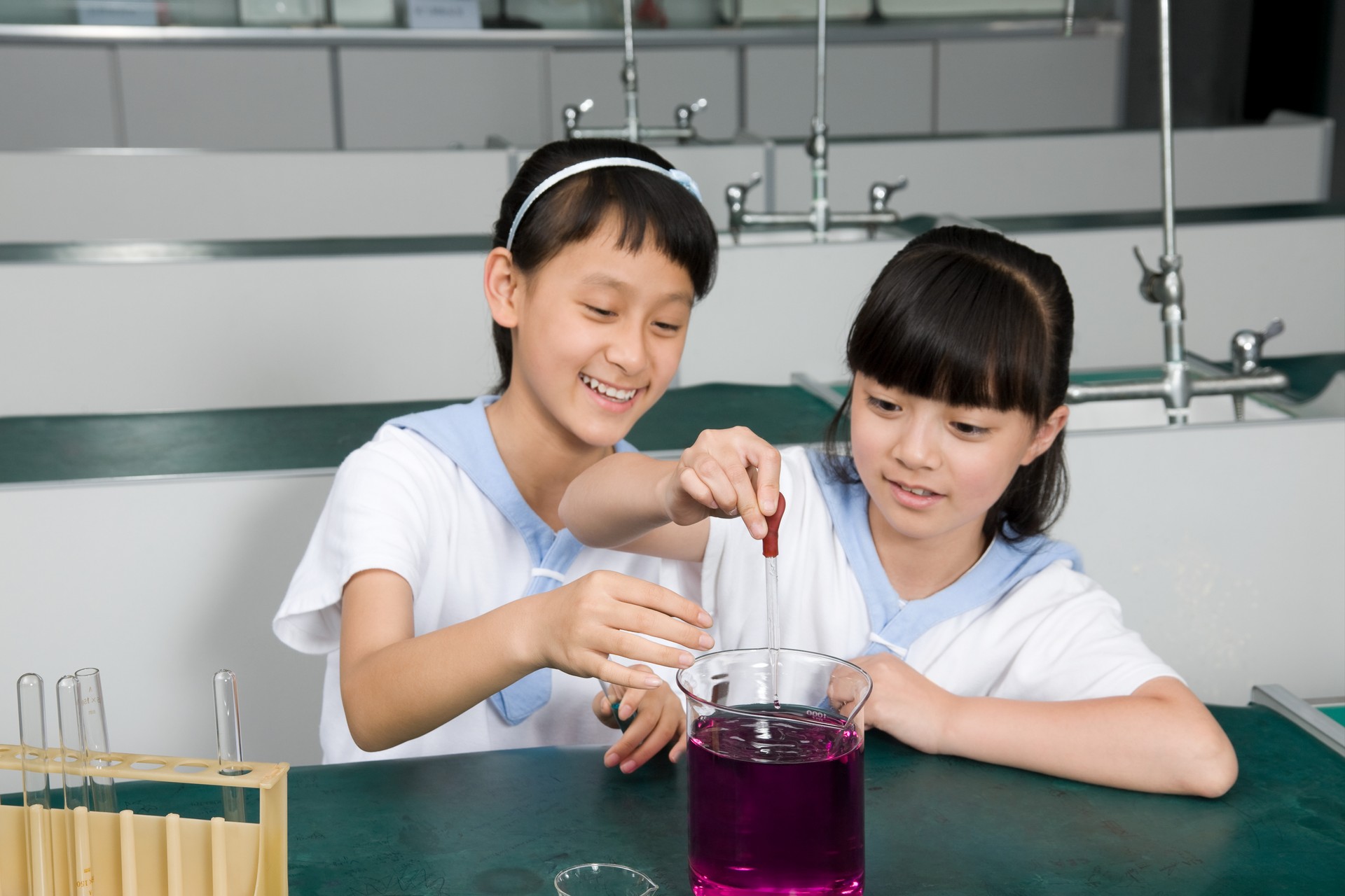 Two girls doing an experiment